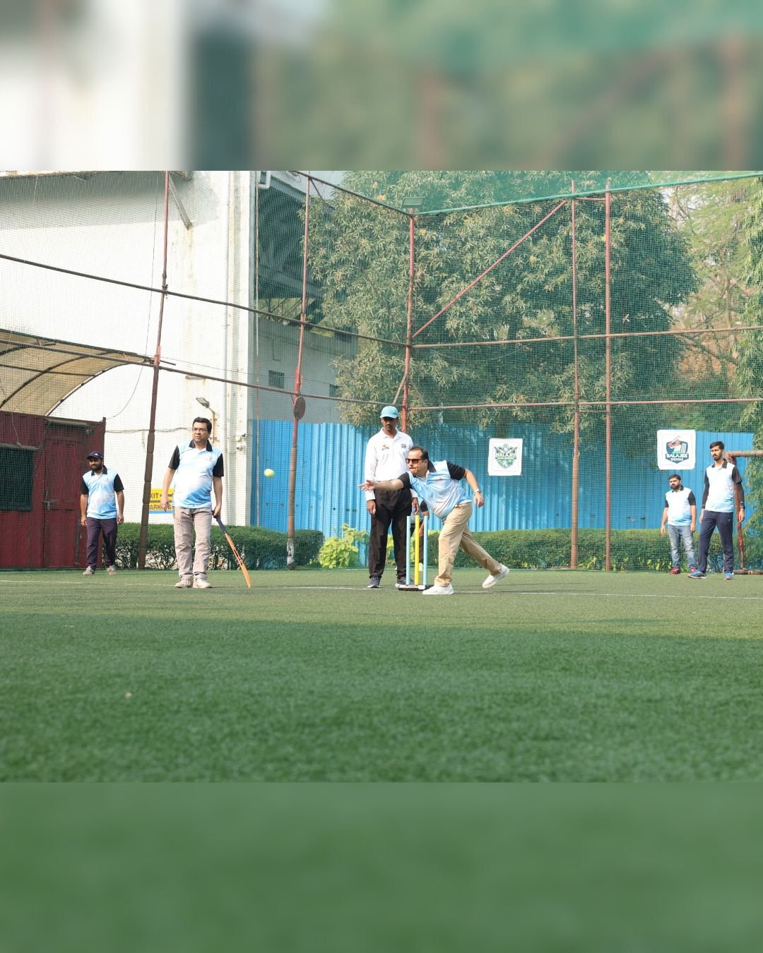 Team members on the cricket field