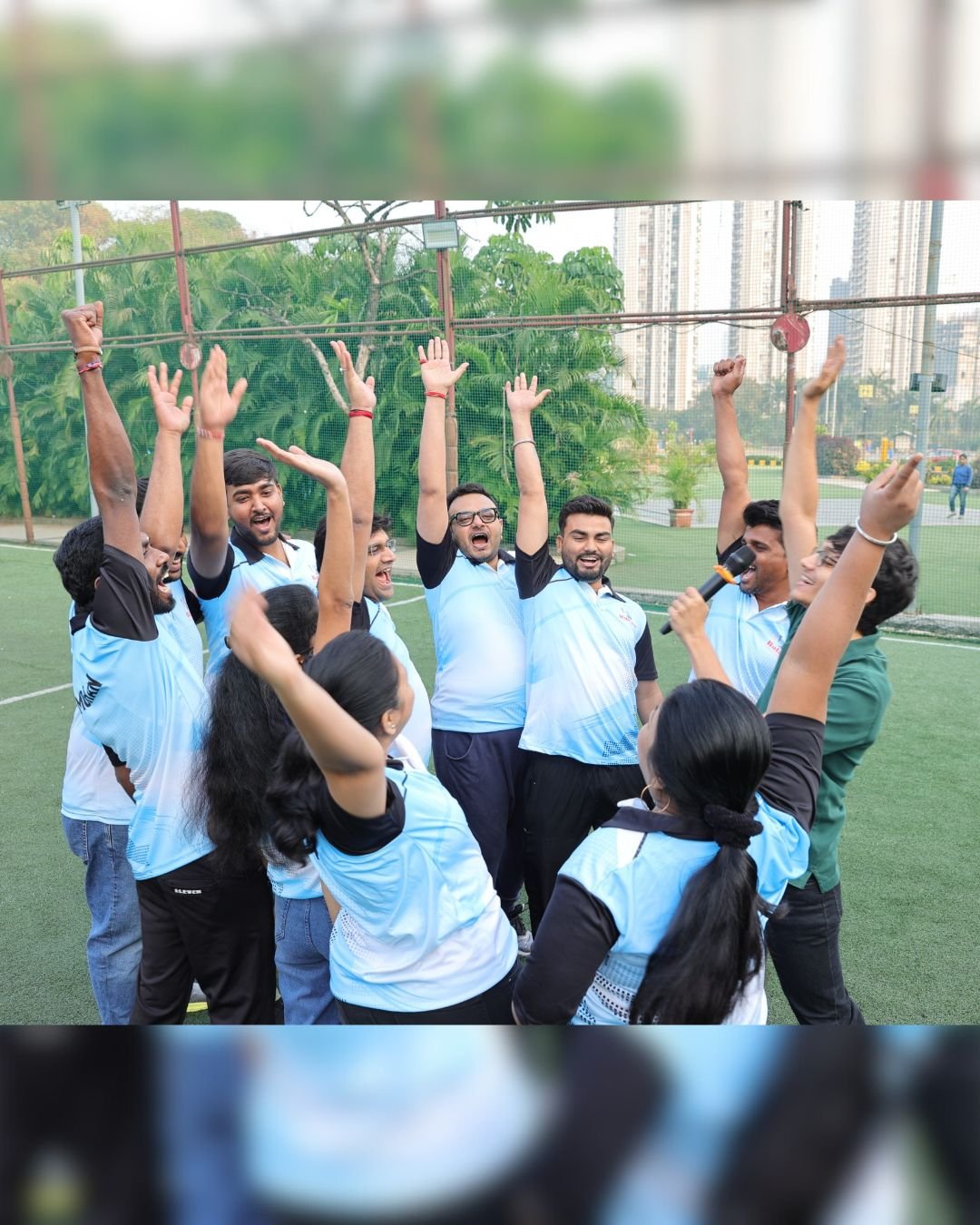 Colleagues cheering during a team activity
