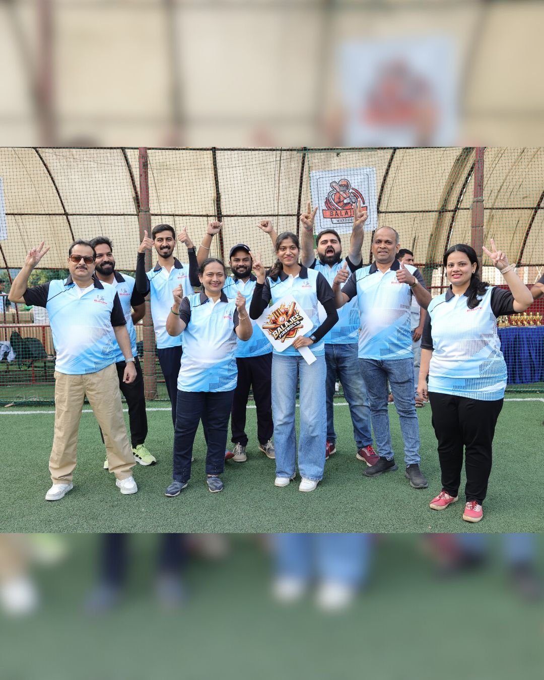 Balajee team members gathered on the sports field