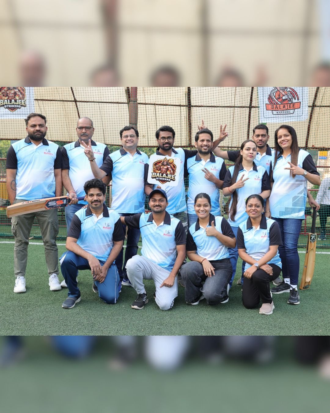 Balajee colleagues posing for a team photo